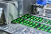 Green,Capsule,Medicine,Pill,Production,Line,,Industrial,Pharmaceutical,Concept