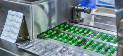 Green,Capsule,Medicine,Pill,Production,Line,,Industrial,Pharmaceutical,Concept