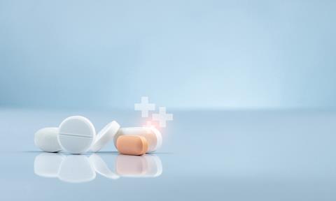 White,And,Orange,Pharmaceutical,Tablets,With,Medical,Cross,Symbols.,Pharmacy