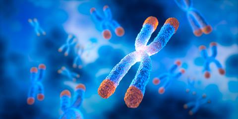Chromosome,With,Telomere,And,Bubble,Floating,On,Blue,Background,-