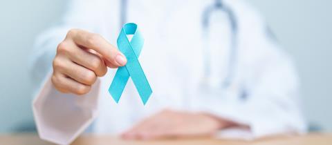 Blue,November,Prostate,Cancer,Awareness,Month,,Doctor,With,Blue,Ribbon