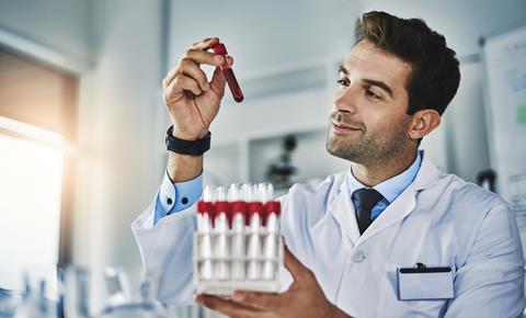 Man,,Scientist,And,Smile,With,Blood,Test,In,Lab,For