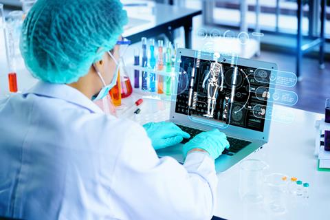 Scientists,Are,Using,Laptop,To,Research,Cancer,Or,Covid,Treatment