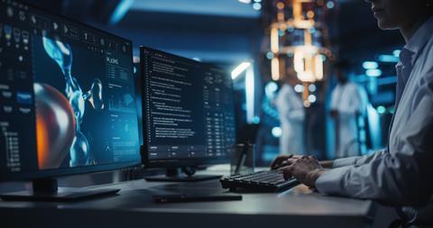 Anonymous,Medical,Researcher,Working,In,Modern,Office,On,A,Desktop