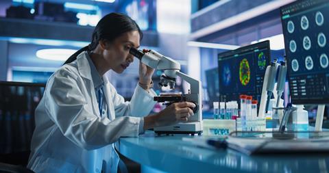 Medical,Research,And,Development,Center:,Female,Asian,Scientist,Using,Microscope