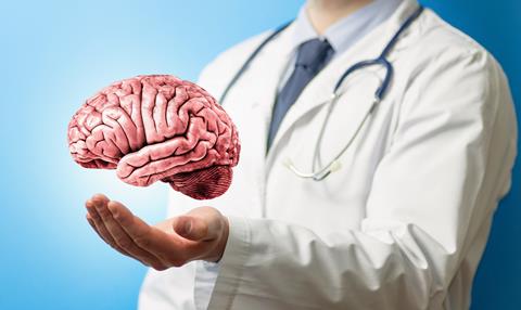 Human,Brain,Model,Over,Doctor?s,Hands.