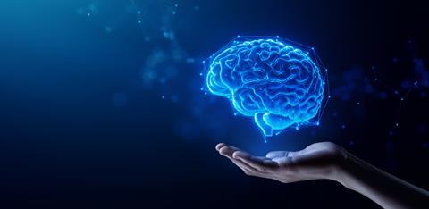 Hand,Holding,Human,Brain,-,Futuristic,Concept,Of,Intelligence,,Science